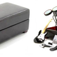 Illustration for article titled Rock Band Ottoman Stores Your Controllers, Stifles Your Dreams